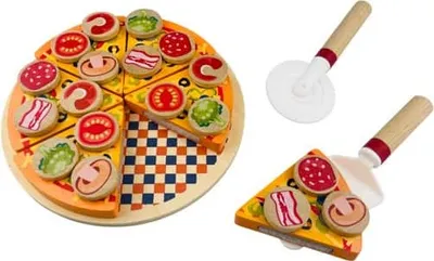 A wooden toy pizza with various toppings and a pizza cutter and server.