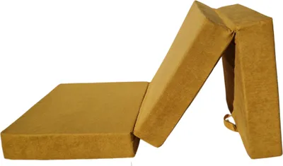 A folded mattress on a white background.