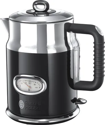 A close-up shot of a black and silver electric kettle.