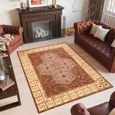 A living room scene with a rug in the center, a fireplace, and furniture.