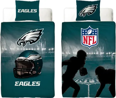 Two sides of a Philadelphia Eagles themed bedding set are shown, one with a helmet and logo, the other with players and the NFL logo.
