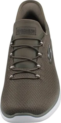 Auf dem Bild ist ein Freizeitschuh in der Farbe Olive abgebildet. Der Schuh ist von der Seite zu sehen und zeigt ein sportliches Design mit einer robusten Sohle.