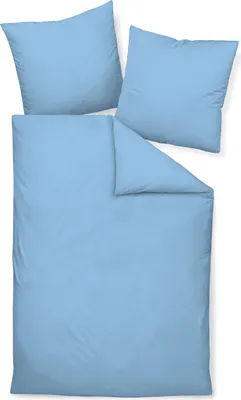 A light blue duvet cover and two pillowcases are laid out on a white background.