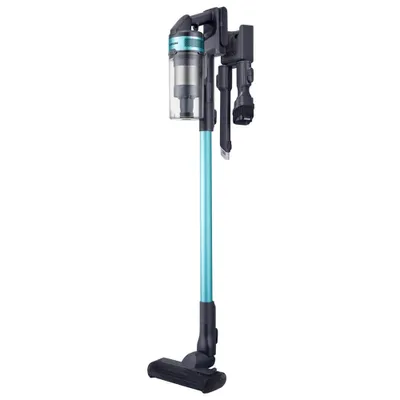 A teal and black cordless vacuum cleaner is shown against a white background.