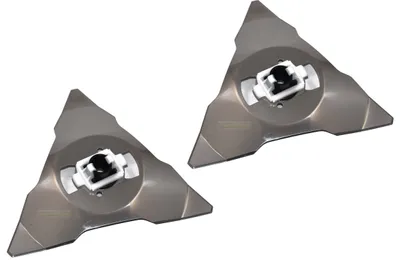 Two triangular lawnmower blades with white and black central fittings are shown against a white background.
