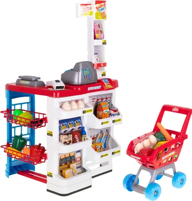A toy supermarket checkout counter and shopping cart with play food.