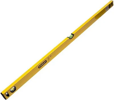 A yellow Stanley level is shown diagonally against a white background.