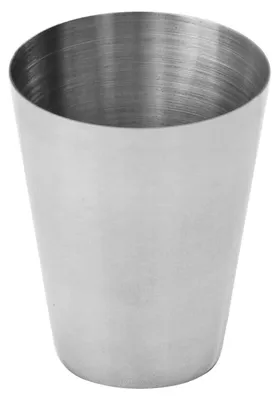 A close-up studio shot of a stainless steel shot glass.