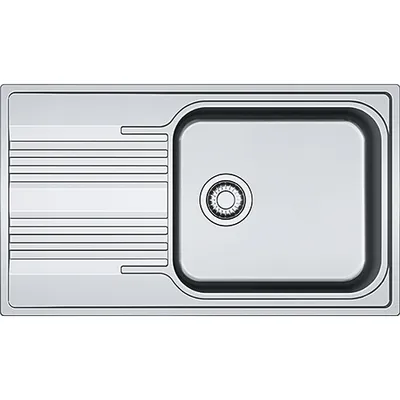 A top-down view of a stainless steel kitchen sink with a drainer.