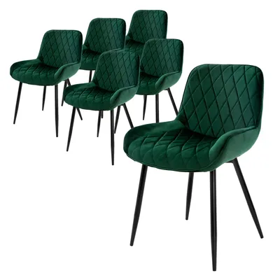 A set of six dark green velvet dining chairs with diamond quilting and black metal legs, arranged on a white background.