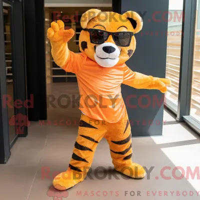 Produktbild von Orange REDBROKOLY Tiger Maskottchen Kostüm Charakter gekleidet mit einem Jeggings und Sonnenbrille