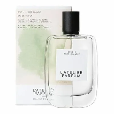 A perfume bottle and its packaging are displayed against a white background.