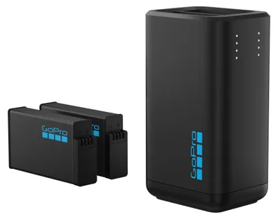 Two black GoPro batteries and a black dual charger are shown against a white background.