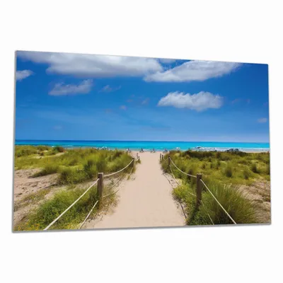 Produktbild von Wallario Herdabdeckplatte aus Glas, Größe 80 x 52 cm 1-teilig, Motiv Sandweg zum blauen Meer mit blauem Himmel