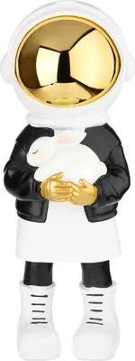 A decorative figurine of an astronaut holding a white rabbit.