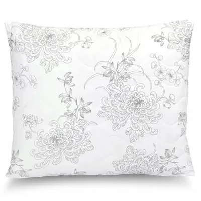 A pillow with a floral pattern.