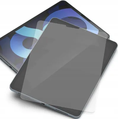 A screen protector is placed on top of a tablet.