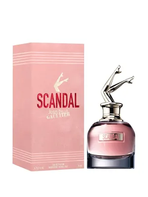 A perfume bottle and its box are displayed against a white background.