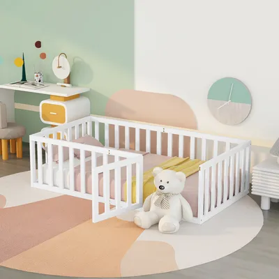 A child's bedroom with a white wooden bed frame, a teddy bear, and a desk.