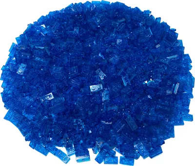 A pile of small, translucent blue building blocks.