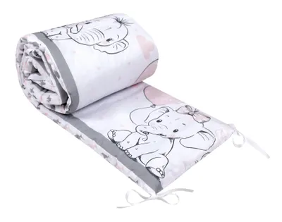 A rolled-up baby crib bumper with an elephant print.