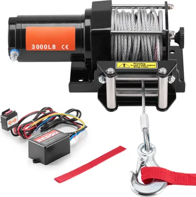 A black electric winch with a steel cable and hook, along with its control box and remote switch, is displayed against a white background.