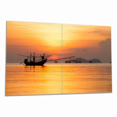 Produktbild von Wallario Herdabdeckplatte aus Glas, Größe 80 x 52 cm 2-teilig, Motiv Thailändisches Fischerboot vor Sonnenuntergang
