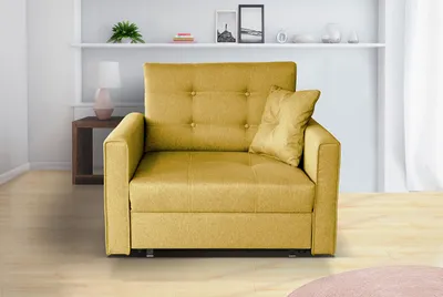 A yellow sofa bed is shown in a living room setting with a side table and a shelf in the background.