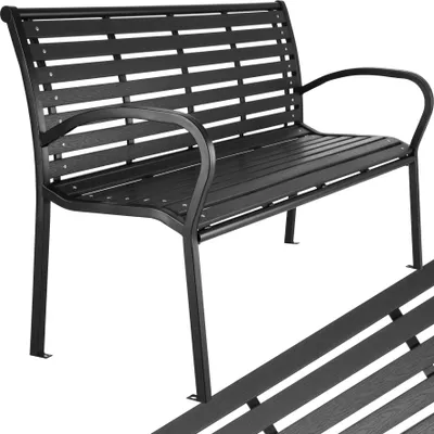 A black metal garden bench with a slatted seat and backrest, shown from a slightly elevated side angle against a white background. A portion of another bench is visible in the foreground, angled diagonally.