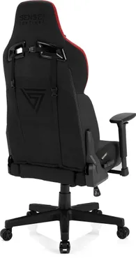 Rear view of a black and red gaming chair on a white background.