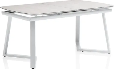 A white metal-framed dining table with a light gray ceramic top, shown from a front-side angle against a white background.