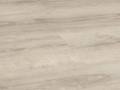 A close-up view of a light-colored wood-grain texture, likely flooring.