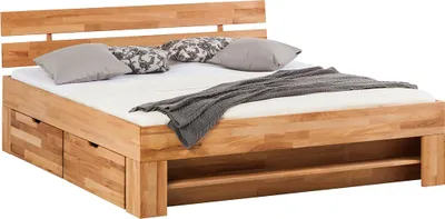 Produktbild von home24 Massivholzbett mit Bettkästen - Kernbuche Massiv