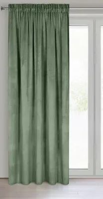 A green curtain hangs in front of a window.