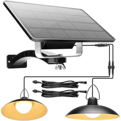 A solar panel connected to two pendant lights.