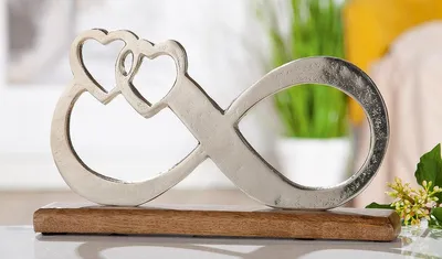 Produktbild von GILDE Symbol Unendlichkeit - Alu Mangoholz silber-farben Breite 32 cm