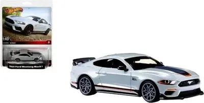 A Hot Wheels 1/43 scale model of a 2022 Ford Mustang Mach 1 is shown, both in its packaging and as a standalone model.