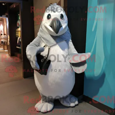 Produktbild von Silberner REDBROKOLY Pinguin-Maskottchen-Kostümcharakter mit Hose und Clutch