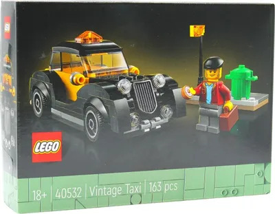 The image shows the retail packaging of a LEGO set featuring a vintage taxi.
