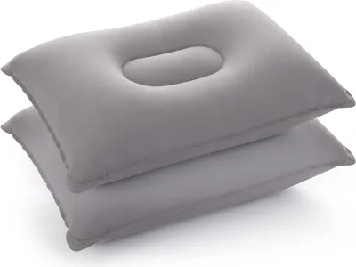 Two gray inflatable pillows stacked on a white background.
