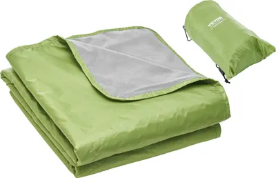 A folded green camping blanket with a gray interior is shown, along with a rolled-up version of the same blanket in a green carrying bag.