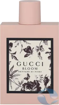 A perfume bottle with a floral and butterfly design on the label.