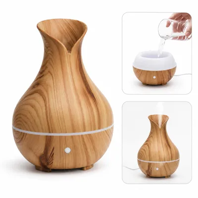 Produktbild von Aroma Diffuser 150ml, Ultraschall Diffuser für ätherische Öle mit 7 Farben LED Licht, leiser Aroma Luftbefeuchter für Schlafzimmer, Büro und Yoga