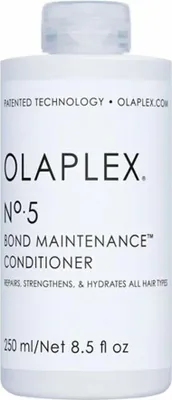 A white bottle of Olaplex No. 5 Bond Maintenance Conditioner against a white background.