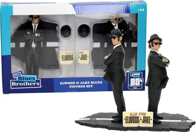 A set of two Blues Brothers action figures, Elwood and Jake, displayed on a road diorama.
