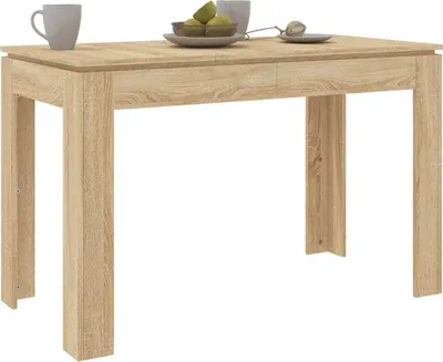A wooden dining table with a white background.