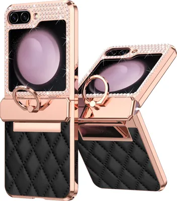 A flip phone case with a quilted black leather bottom and a rose gold frame adorned with rhinestones.
