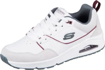 A white sneaker with gray and maroon accents is shown from a side-angle on a white background.
