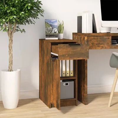 A wooden desk cabinet with an open drawer and shelves, next to a potted plant.
