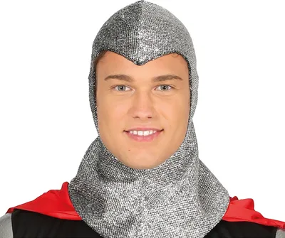 A man wearing a medieval warrior costume, including a chainmail hood and a red cape.